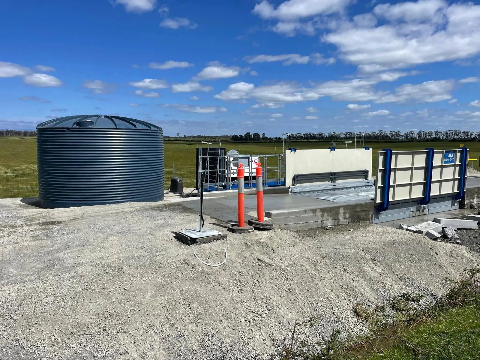 MobyDick wash system with recycle tank and galvanised wash ramp on a construction site in Tasmania
