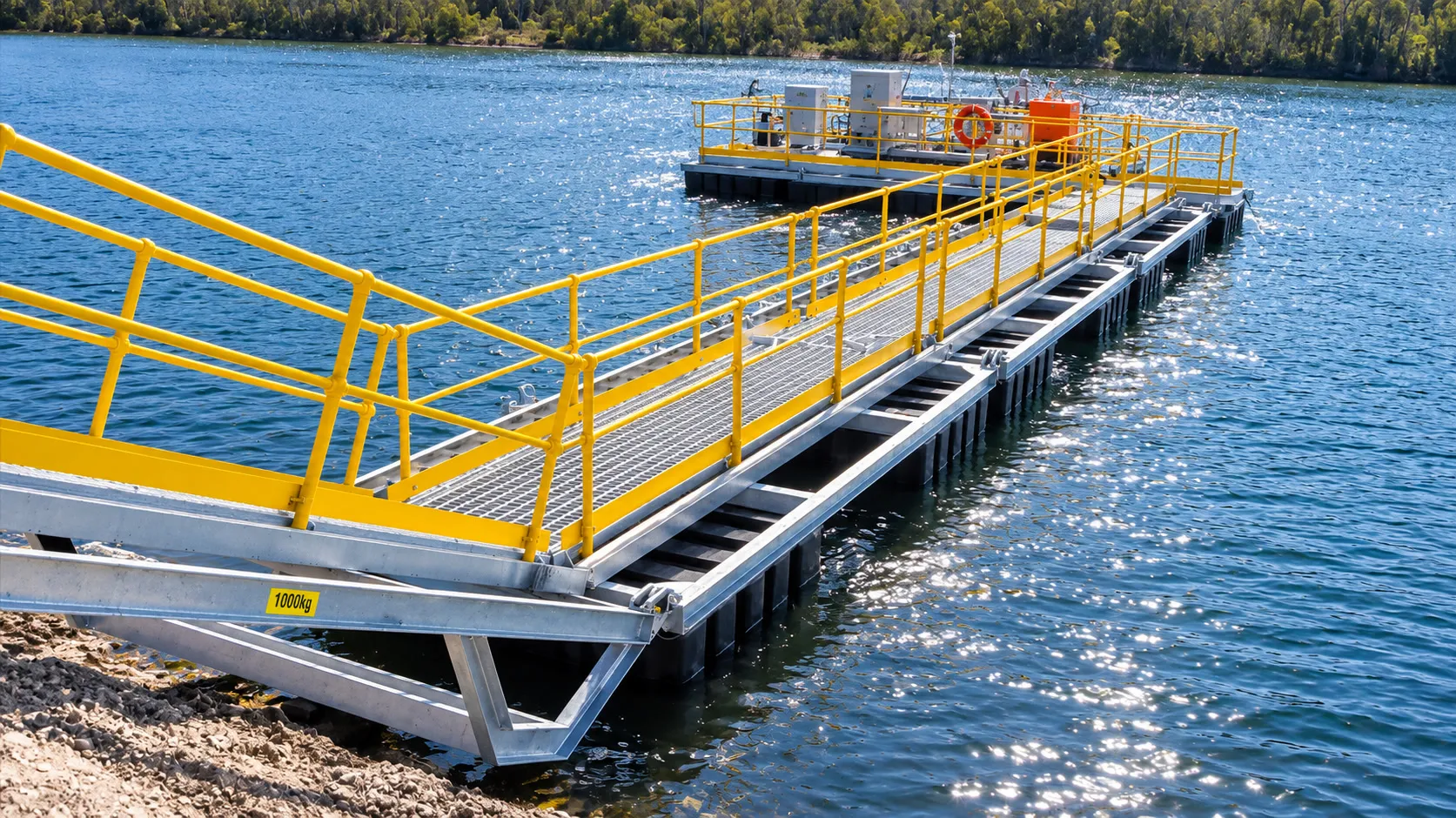 Floating pontoon with a yellow-railed access walkway on a water storage